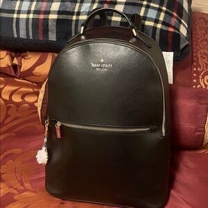 Kate Spade Black leather Backpack with Gold Accents